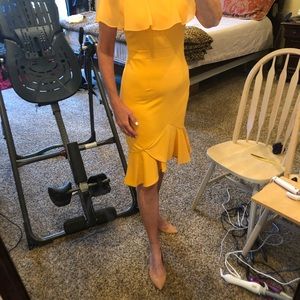 Women’s sunflower yellow lace and ruffle dress.